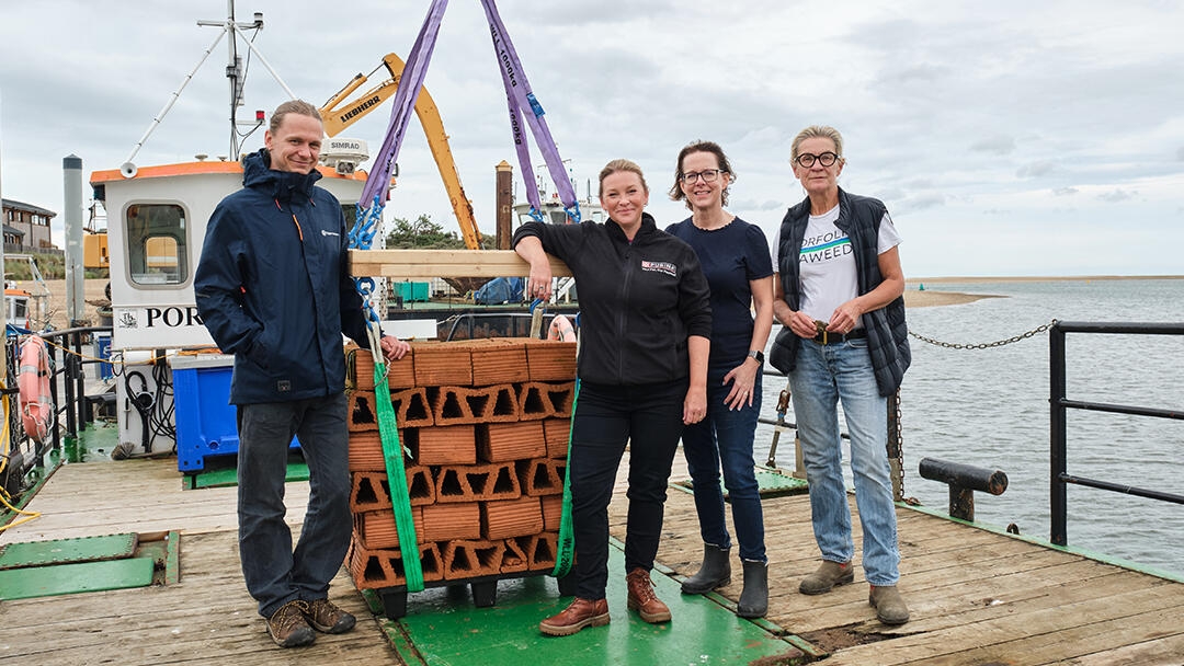 George, Jo, Claire and Allie aboard the board with the oyster crates